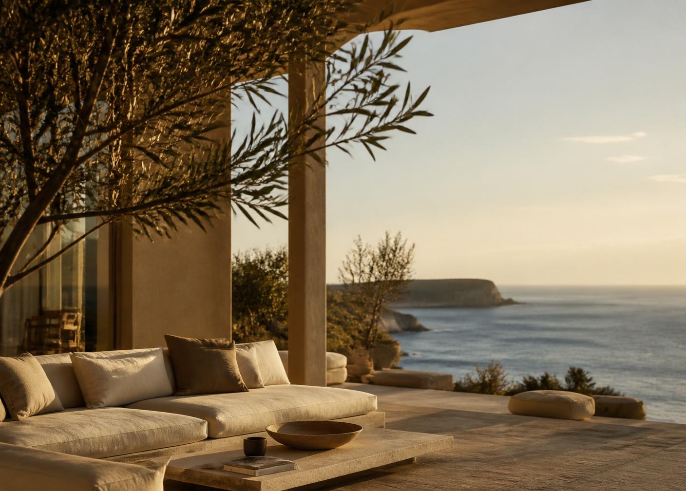 Villa Pinheiro — The lowest villa reaches furthest toward the sea, its living pavilion cantilevered over the slope so the terrace appears to hover above the Atlantic.